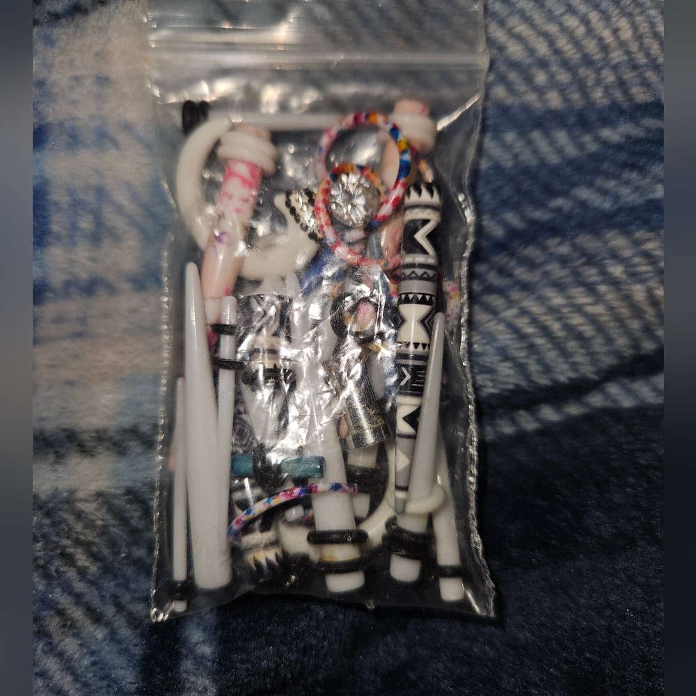 Ear tapers and plugs
